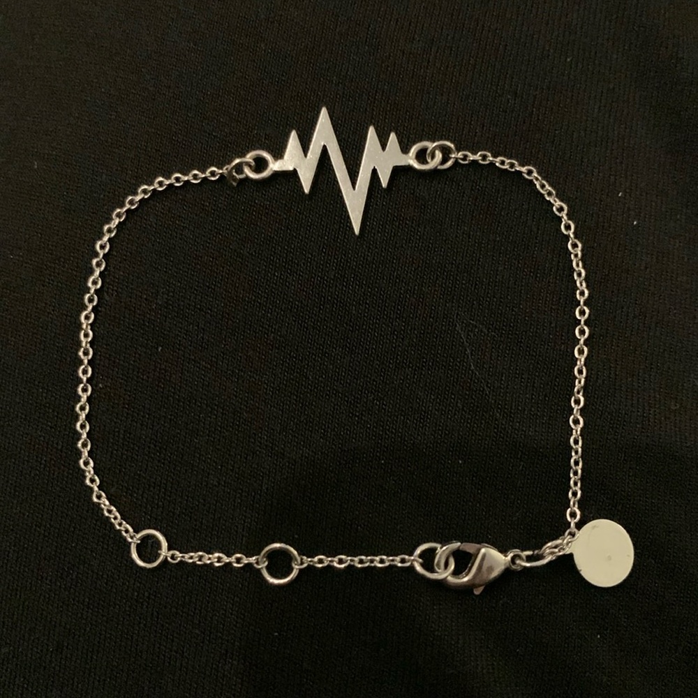 Lightening Bolt Bracelet integrated on delicate silver tone chain - 7.25”